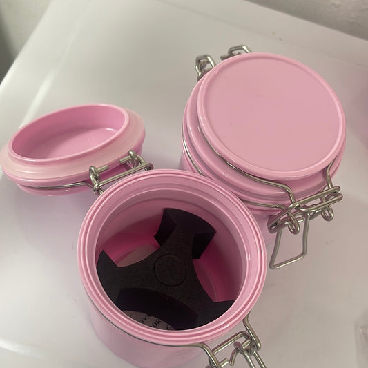 Pink adhesive container